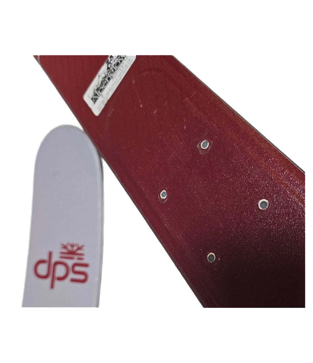 Maroon tie with visible defects next to a white card with 'dpstk' branding on a white background